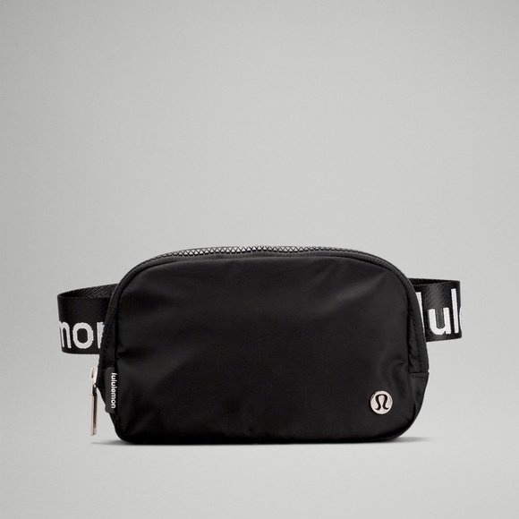 lululemon athletica Handbags - NWT Lululemon Everywhere Belt Bag Black with White Logo Extended Strap Version